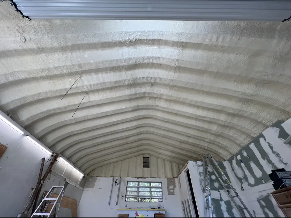 Spray polyurethane foam applied to the underside of a metal roof deck in Fairfield